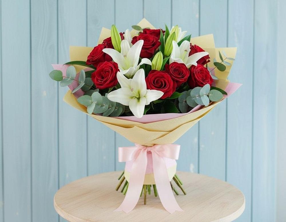 Букет цветов из: Лилии и Розы в Питерке